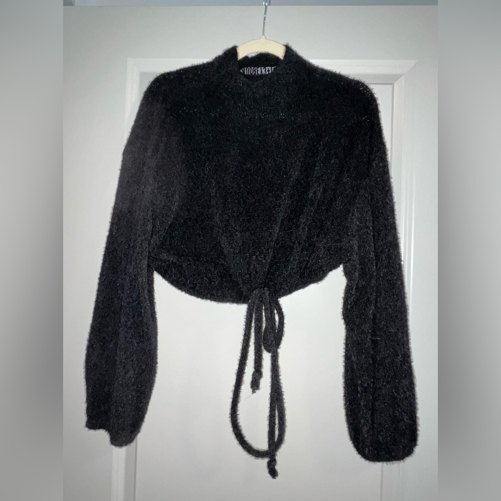 Black tie sweater